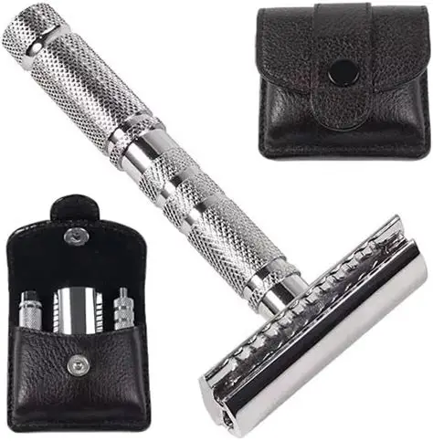 Disassembled chrome safety razor with textured handle, alongside two black leather travel pouches.
