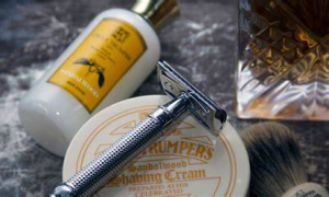 Sandalwood shaving cream, brush, and safety razor kit.