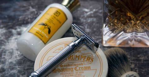 Sandalwood shaving cream, brush, and safety razor kit.